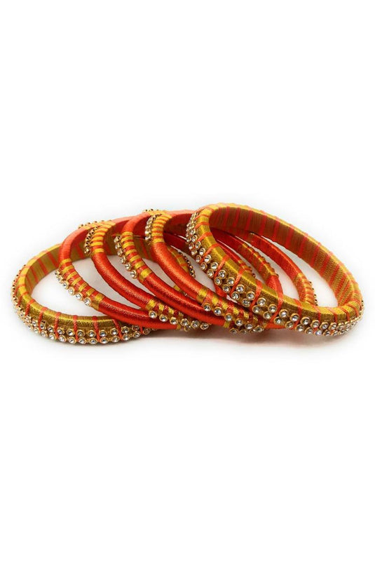 Silk Thread Customized Handmade Bangles Set In Golden And Orange Color